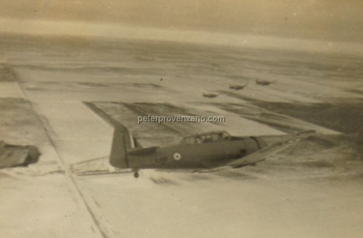 Peter Provenzano Photo Album Image_copy_130.jpg - North American Harvard IIB (AT-6A), advance trainers of the Royal Canadian Air Force (RCAF) in fligh over Saskatchewan Canada, 1942 .